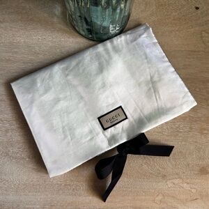 Gucci Ivory Pouch with Black Bow